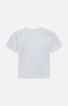 Back view of the RAG & BONE Floral Cutout Kelly Boxy T-shirt, a white summer tee featuring delicate floral cut-out embroidery on the shoulders and sleeves.