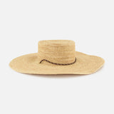 The RAG & BONE Frankie Paracord Boater Hat is a wide-brimmed raffia sun hat with a flat crown, simple woven texture, thin dark brown band, and UPF 50+ protection, shown against a white background.