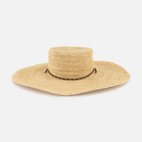 The RAG & BONE Frankie Paracord Boater Hat is a wide-brimmed, natural raffia sun hat with a flat crown and a brown paracord trim, shown against a white background.