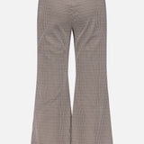 Back view of the RAG & BONE Irina Printed Kick Flare Pant in black-and-white micro check ponte fabric, featuring a high-waisted fit, center seam, and a clean look without visible pockets or embellishments.