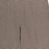 The RAG & BONE Irina Printed Kick Flare Pant features a small brown and white micro check in ponte fabric, shown from waist to upper thigh with a visible top zipper.