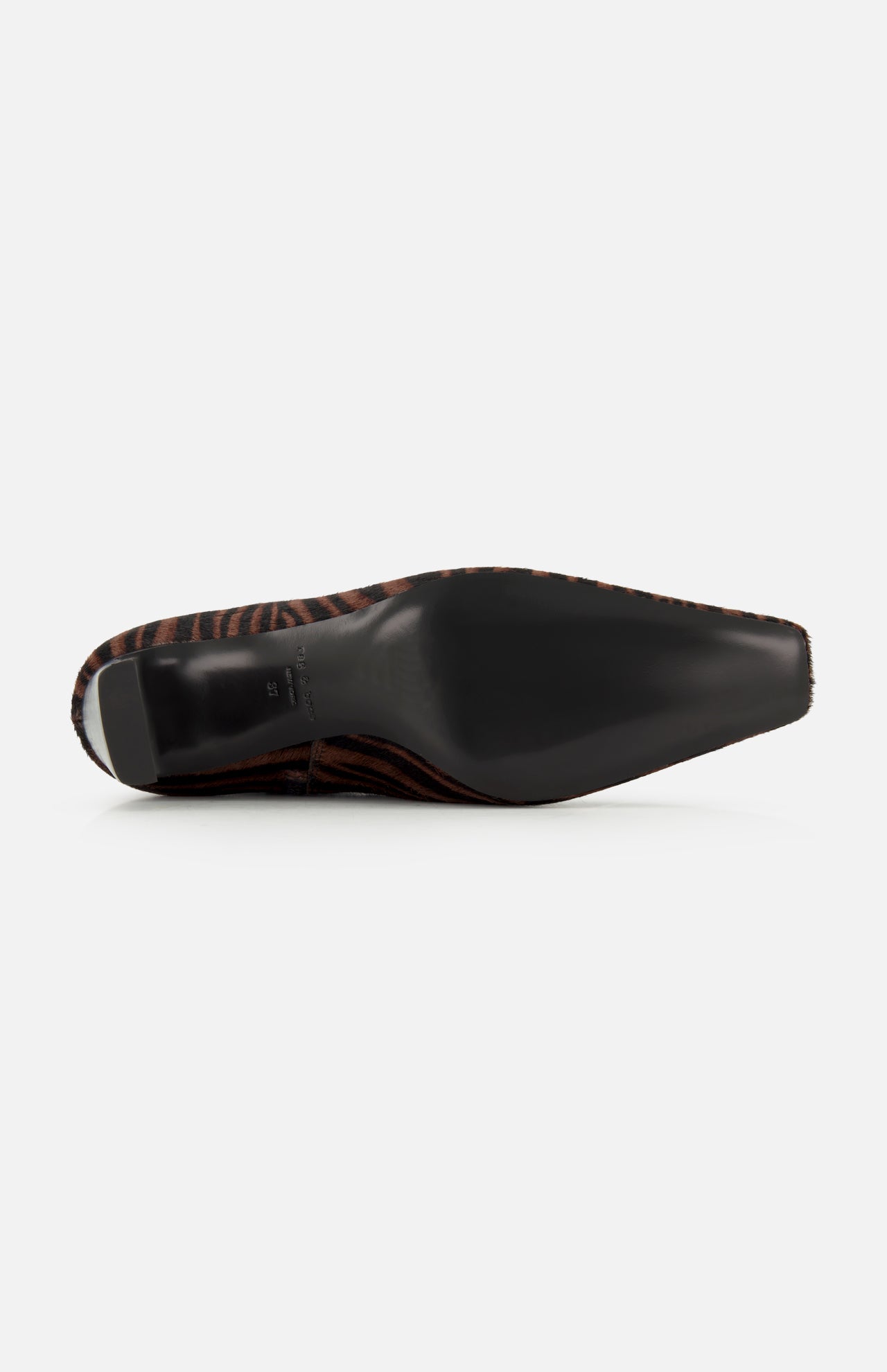 The image shows the bottom view of the Kai Zebra Ankle Boot by RAG & BONE, featuring a black sole and a brown and black zebra print upper.