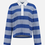 The Kelly Stripe Long Sleeve Polo Shirt by RAG & BONE features horizontal blue, white, and light blue stripes, a white collar, buttoned placket, and is crafted from soft Peruvian cotton for a relaxed, slightly cropped fit.