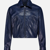 The Krista Faux Leather Jacket by RAG & BONE—a dark blue cropped bomber style with a pointed collar, front zipper, and long sleeves with cuff details—is displayed against a plain white background.