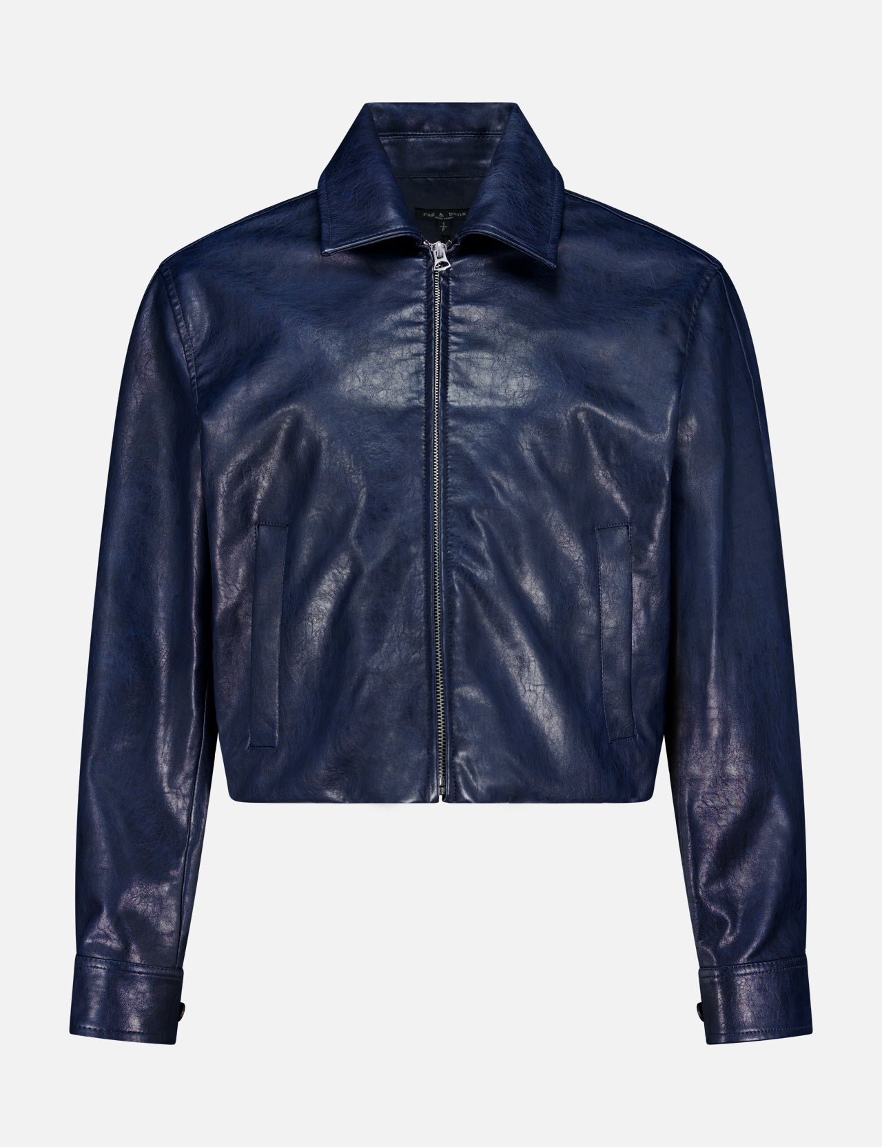 The Krista Faux Leather Jacket by RAG & BONE—a dark blue cropped bomber style with a pointed collar, front zipper, and long sleeves with cuff details—is displayed against a plain white background.