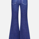 Back view of the Miramar Ponte Dahlia Flare Jean in Nolita by RAG & BONE, showcasing a blue denim-inspired print with two rear pockets and signature flared legs in the classic Miramar style, displayed on a plain white background.