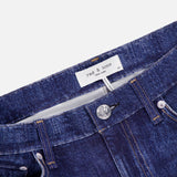 Close-up of the Miramar Ponte Dahlia Flare Jean in Nolita by RAG & BONE, featuring a visible “RAG & BONE” label above the waistband, silver button, and front pockets, displayed against a white background.
