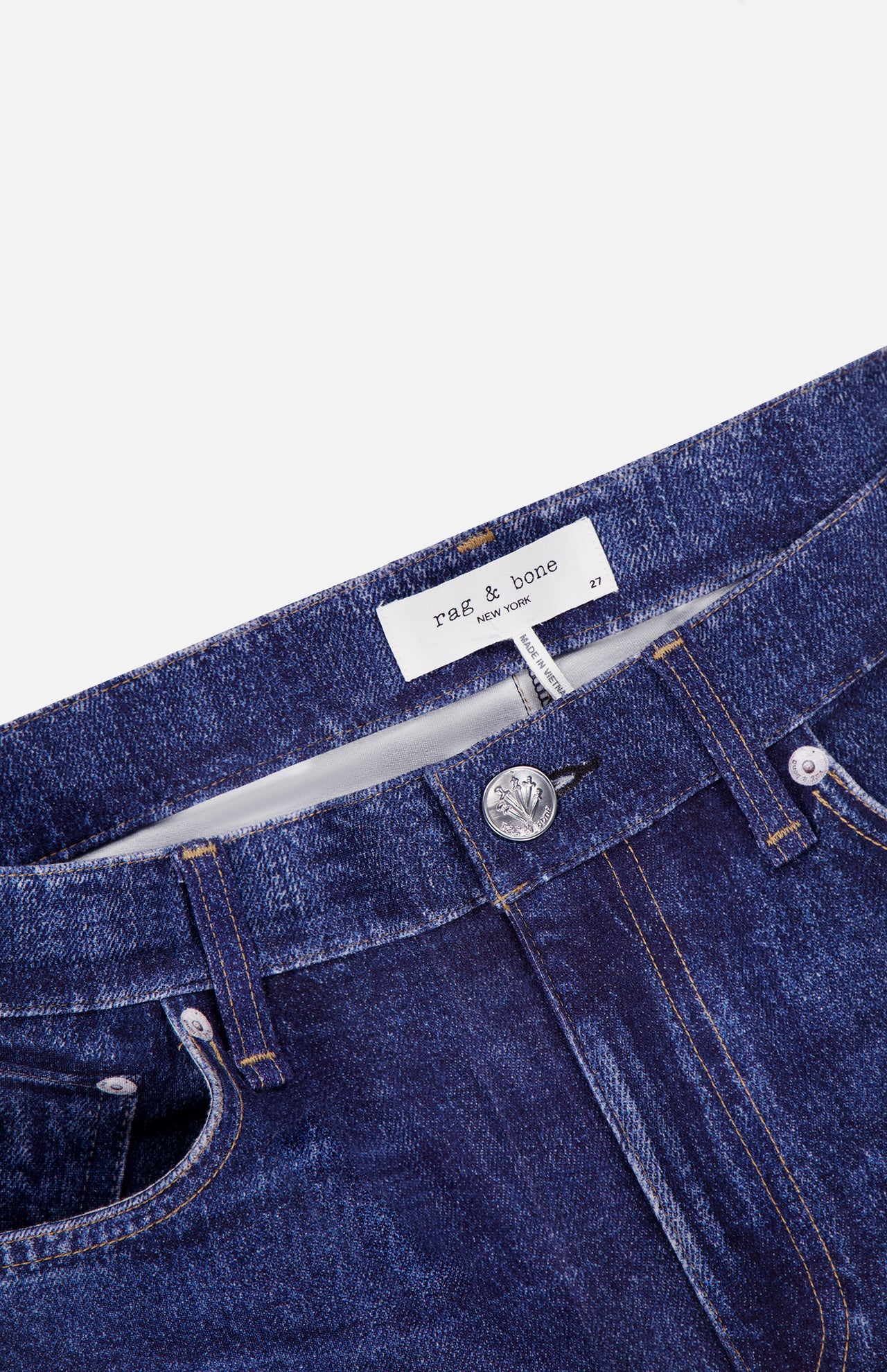Close-up of the Miramar Ponte Dahlia Flare Jean in Nolita by RAG & BONE, featuring a visible “RAG & BONE” label above the waistband, silver button, and front pockets, displayed against a white background.