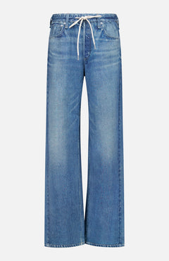 The RAG & BONE Miramar Terry Drawstring Wide Leg Pant in Ellis features a wide-leg silhouette with a faded denim look, classic five-pocket styling, and a white drawstring waist, all crafted from soft cotton terry cloth and showcased against a plain white background.
