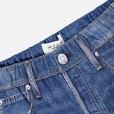 Close-up of the Miramar Terry Track Pull On Pant in Carst by RAG & BONE, featuring blue denim look, elastic waistband, front pockets, visible button, and the brand's Miramar technique for exceptional comfort and style.