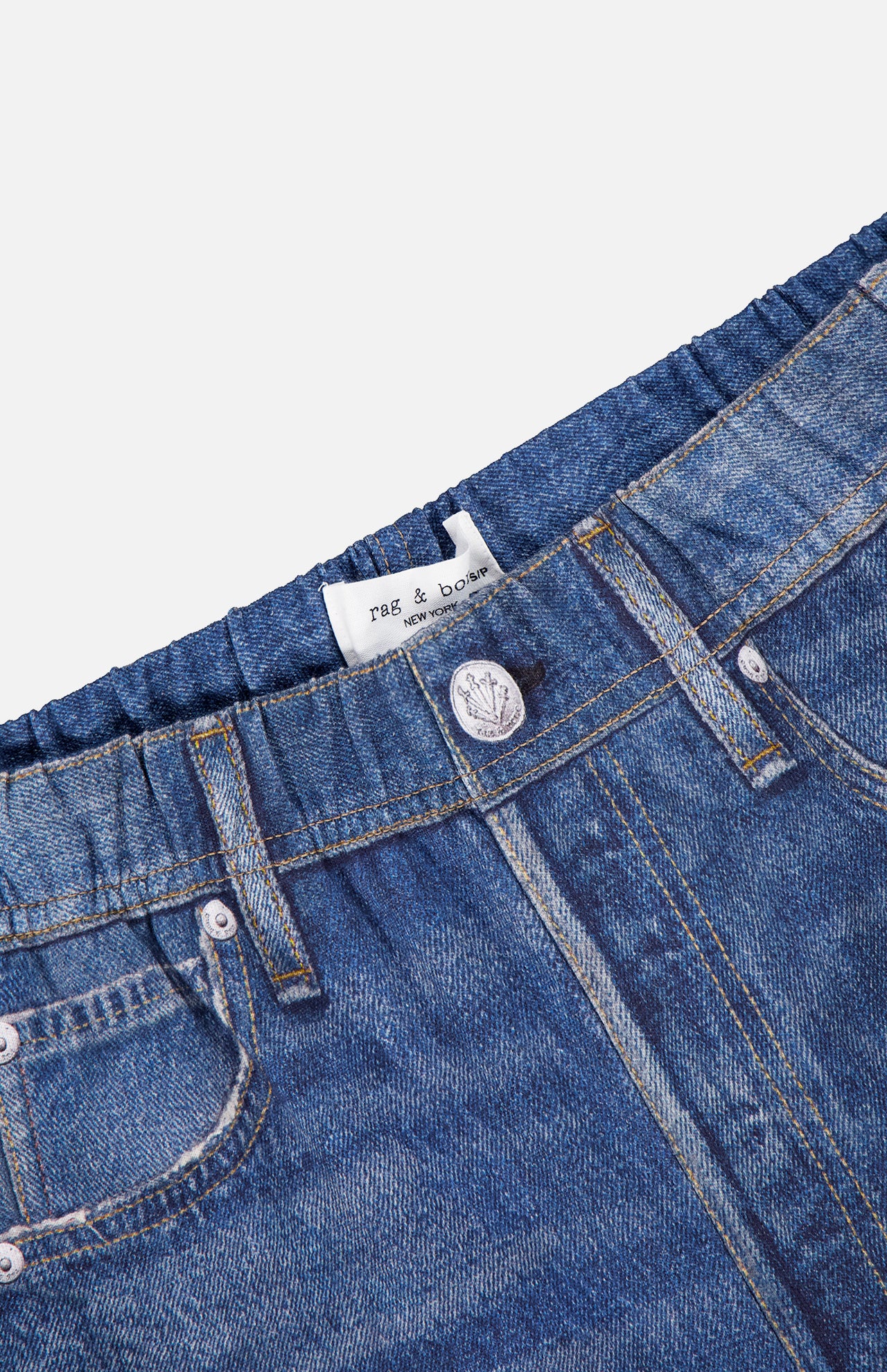 Close-up of the Miramar Terry Track Pull On Pant in Carst by RAG & BONE, featuring blue denim look, elastic waistband, front pockets, visible button, and the brand's Miramar technique for exceptional comfort and style.