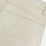Close-up of the back pocket and waistband on RAG & BONE's Stevie Utility Tapered Pant in light tan 100% cotton, highlighting utility-inspired stitching and belt loops.