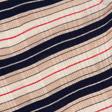 Close-up of the Teresa Silk Stripe Crewneck Shirt by RAG & BONE, featuring fabric with wavy horizontal stripes in navy blue, beige, and thin red lines for an abstract, textured look—ideal for a striped sweater crafted from silk-infused yarn.