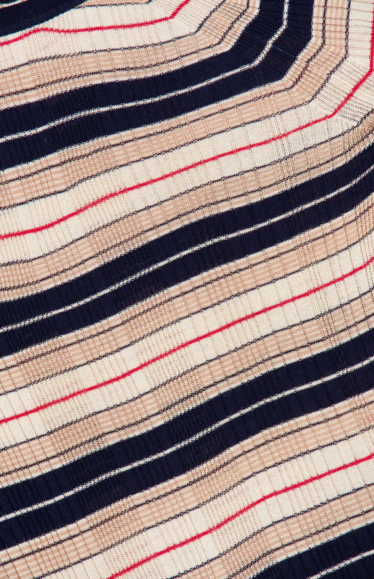 Close-up of the Teresa Silk Stripe Crewneck Shirt by RAG & BONE, featuring fabric with wavy horizontal stripes in navy blue, beige, and thin red lines for an abstract, textured look—ideal for a striped sweater crafted from silk-infused yarn.