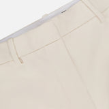 Close-up of the waistband and upper section of the RAG & BONE Vicky Barrel Leg Ponte Pant, featuring belt loops, a pocket, and part of the zipper area against a white background.