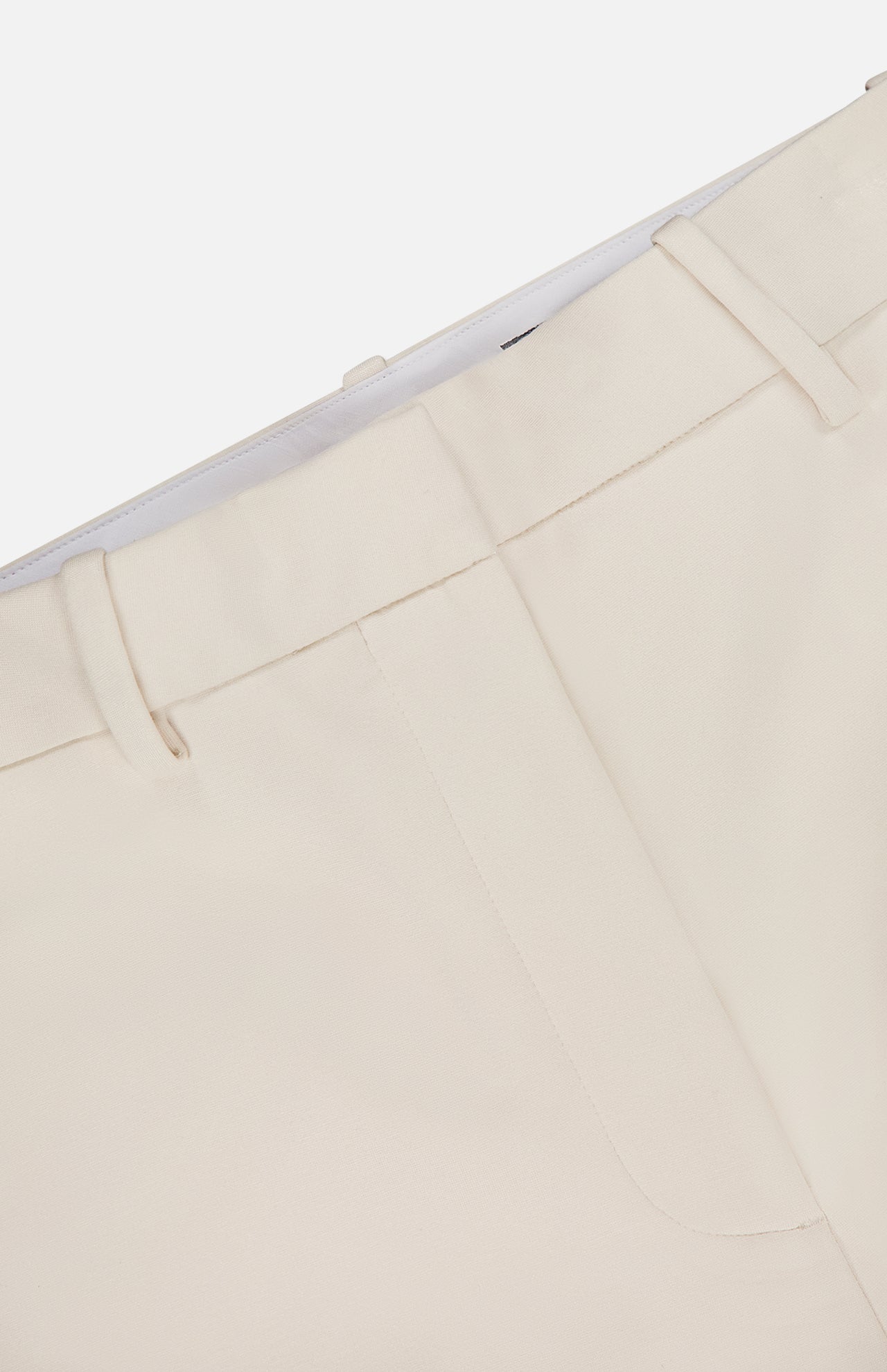 Close-up of the waistband and upper section of the RAG & BONE Vicky Barrel Leg Ponte Pant, featuring belt loops, a pocket, and part of the zipper area against a white background.
