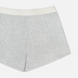 The RAG & BONE Vintage Terry Mix Media Sweatshort, shown flat against a white background, features a light gray cotton blend and a white elastic waistband with only the back side visible. Ideal for versatile travel style.
