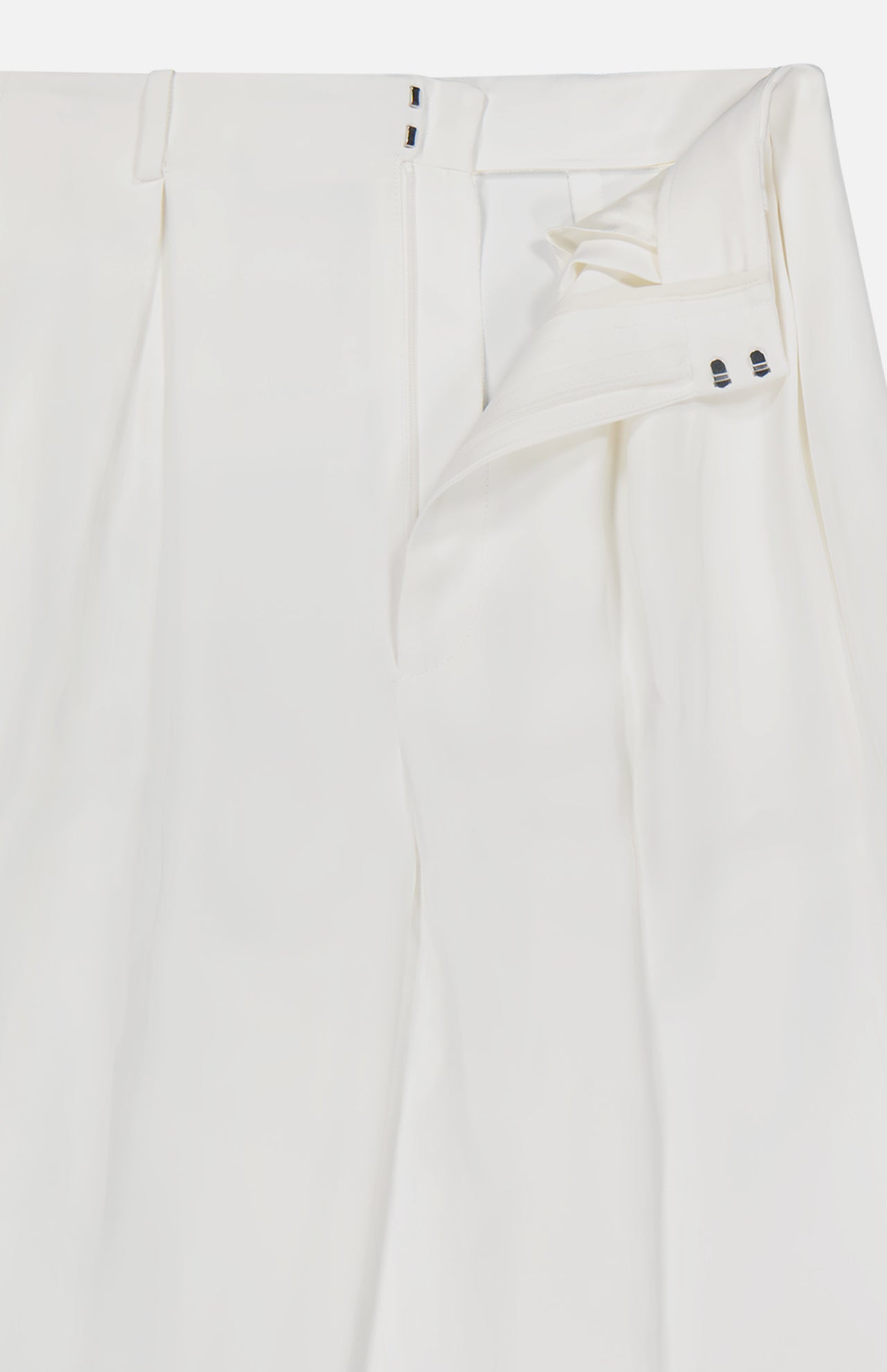 The Greer Pleated Viscose Trouser Pants by RALPH LAUREN COLLECTION feature a high rise, wide-leg silhouette, pleats, and a partially open waistband with double hook-and-bar closure. The smooth, slightly shiny fabric enhances its formal appeal.