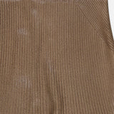 Close-up of the Adrianna Silk Skirt by RALPH LAUREN COLLECTION, showcasing its ribbed brown silk fabric with a metallic sheen and diagonal stitching detail on the top right side.