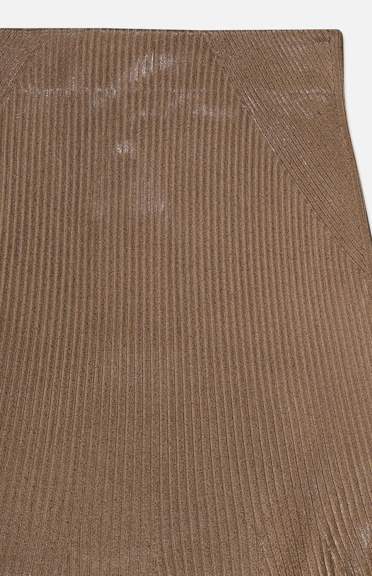 Close-up of the Adrianna Silk Skirt from RALPH LAUREN COLLECTION, featuring brown ribbed fabric with a lustrous finish and an angled seam at the top right corner. The texture appears soft and subtly reflective.