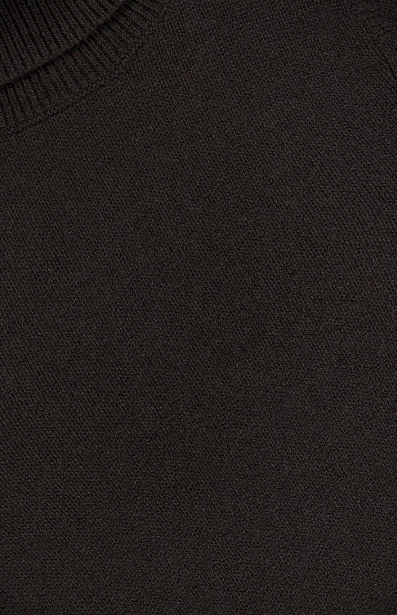 Close-up of a dark brown knitted fabric from the RALPH LAUREN COLLECTION Cashmere Turtleneck Long Sleeve Sweater, highlighting its detailed texture and featuring part of the ribbed neckline in the top left corner.