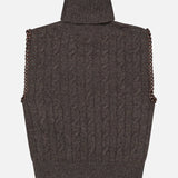 The RALPH LAUREN COLLECTION Cashmere Turtleneck Sleeveless Sweater in dark brown showcases a classic cable-knit design with a modern twist, featuring a ribbed collar and hem and chain detailing along the armholes. Displayed against a plain white background, this versatile piece reimagines the timeless sleeveless turtleneck silhouette in luxurious cashmere.