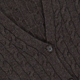 Close-up of a dark brown RALPH LAUREN COLLECTION Cashmere V-Neck Cardigan Sweater featuring a cable-knit pattern and matching buttons.