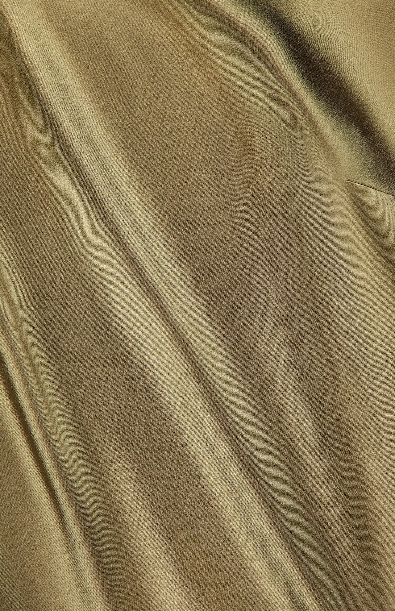 The Chilton Satin Sleeveless Blouse by RALPH LAUREN COLLECTION features smooth, shiny light brown or gold Italian fabric with soft folds and a silky, flowing texture—ideal for an elegant look.