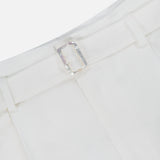 Close-up of the waistband of Denise Classic Linen Shorts by RALPH LAUREN COLLECTION, featuring belt loops and a clear rectangular buckle. The lightweight, textured linen is ideal for summer suiting or versatile warm-weather styling.