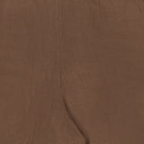 Close-up of the Greer Full Length Pleated Pant by RALPH LAUREN COLLECTION, featuring a textured brown linen fabric, waistband with belt loops, clean front seam, and high-rise wide-leg silhouette.