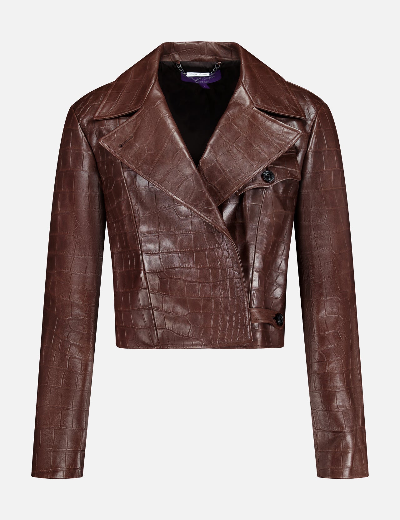 The Jaxson Leather Moto Jacket from the RALPH LAUREN COLLECTION is a cropped brown lambskin design with an eye-catching crocodile-embossed pattern, long sleeves, wide lapels, and an asymmetrical button closure—exuding the timeless sophistication of Ralph Lauren. Shown against a plain white background.
