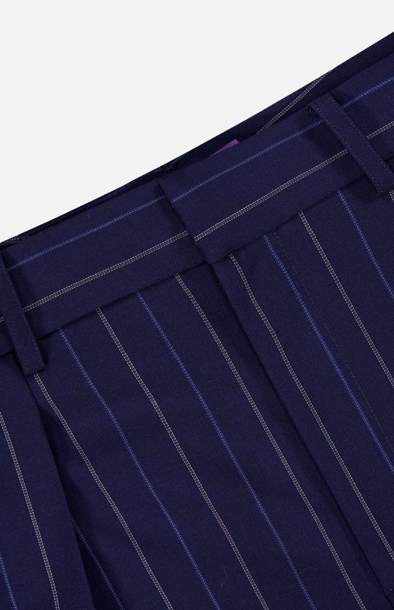 Close-up of the Jody Pleated Trouser Pant by RALPH LAUREN COLLECTION in navy ultrafine wool crepe, detailed with light blue and white pinstripes, belt loops, a waistband, and a high-rise straight-leg silhouette.