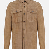 The Landry Lightweight Suede Long Sleeve Shirt by RALPH LAUREN COLLECTION is shown on a plain white background, featuring a light brown luxury suede fabric, button-up front, classic collar, long sleeves, and two chest pockets with flaps and buttons.