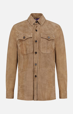 The Landry Lightweight Suede Long Sleeve Shirt by RALPH LAUREN COLLECTION is shown on a plain white background, featuring a light brown luxury suede fabric, button-up front, classic collar, long sleeves, and two chest pockets with flaps and buttons.