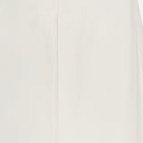 A close-up of the Masina Lux Satin Maxi Skirt by RALPH LAUREN COLLECTION shows its plain, off-white design and a prominent vertical center seam.
