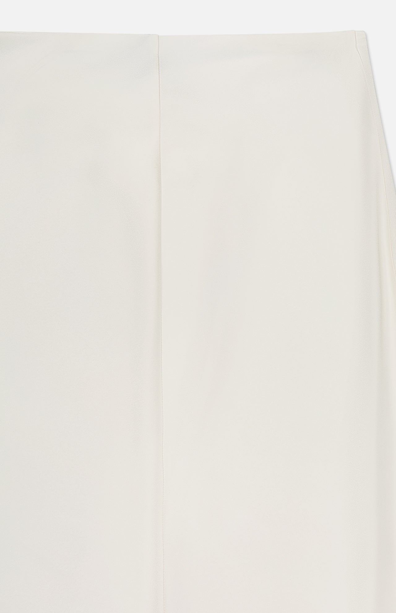 A close-up of the Masina Lux Satin Maxi Skirt by RALPH LAUREN COLLECTION shows its plain, off-white design and a prominent vertical center seam.