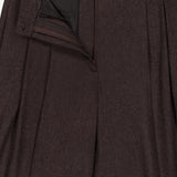 A close-up view of the RALPH LAUREN COLLECTION Mini Herringbone Standard Pants in dark brown, with the zipper and button fly open, highlighting the pleats and part of the waistband.