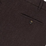 Close-up of the RALPH LAUREN COLLECTION Mini Herringbone Standard Pants in dark brown, showcasing a waistband with belt loops and a back pocket fastened with a single button.