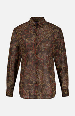 Elevate your fall wardrobe with the Paisley Collared Long Sleeve Blouse from RALPH LAUREN COLLECTION—a button-up blouse featuring long sleeves and a dark brown base adorned with an intricate paisley print in rich shades of red, gold, and tan.