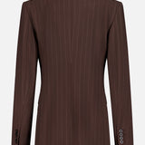 The Ramona Wide Stripe Blazer by RALPH LAUREN COLLECTION is a dark brown wool blazer with a tailored fit, subtle vertical white stripes, and buttoned cuffs, shown from the back.