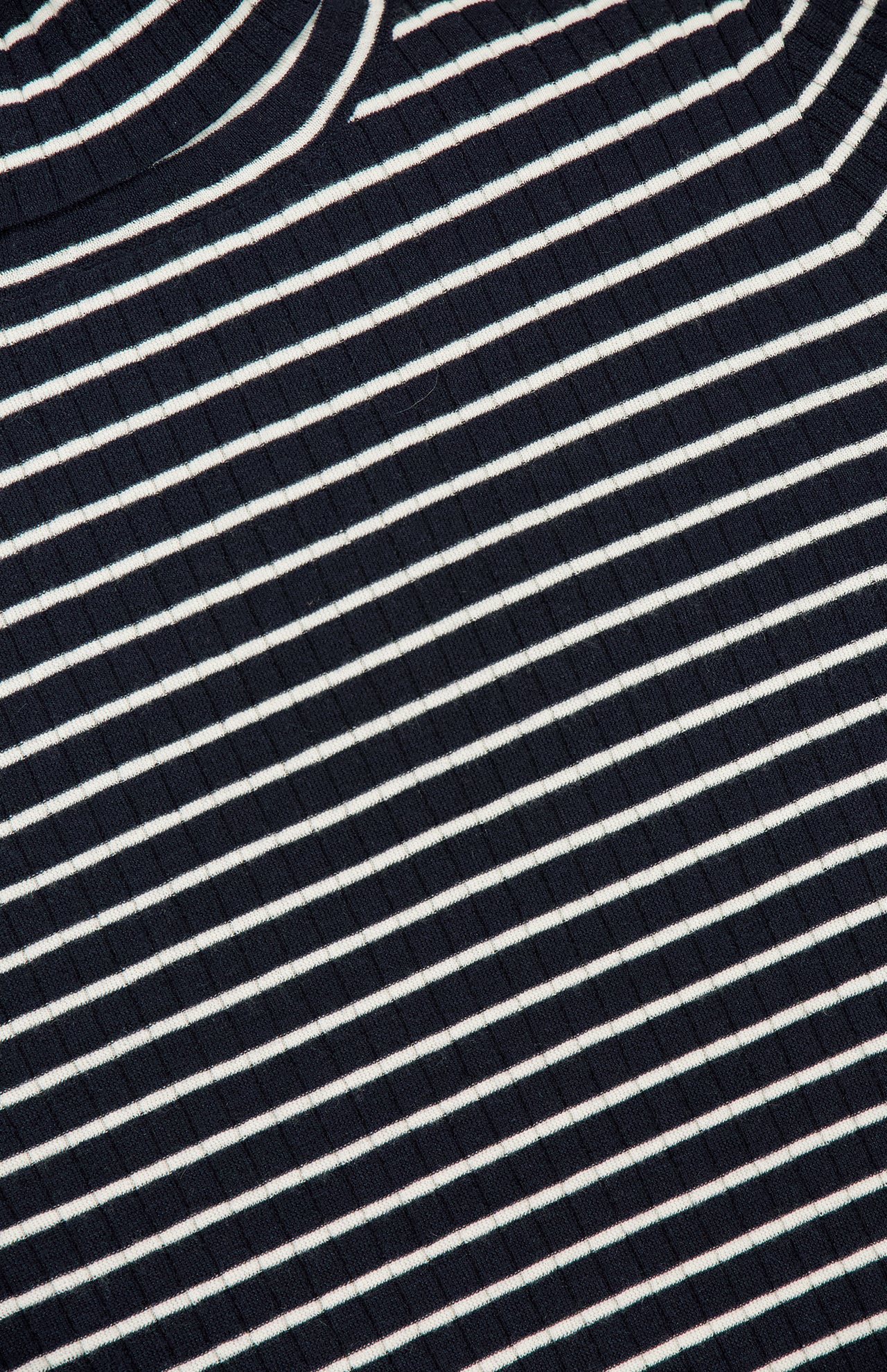 A close-up of the RALPH LAUREN COLLECTION Ribbed Striped Turtleneck Sweater showcases its navy and white stripes and textured pattern.
