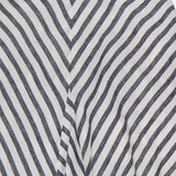 Close-up of the Shamus Umbrella Stripe Maxi Skirt by RALPH LAUREN COLLECTION, featuring diagonal navy and white chevron stripes and a tailored waistband—ideal for a classic linen floor-length or A-line skirt look.