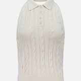 The Sleeveless Halter Polo Pullover Sweater by RALPH LAUREN COLLECTION is a lightweight, cream-colored summer knit featuring a polo collar and sleeveless design—ideal for warm-weather layering.