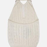 The RALPH LAUREN COLLECTION Sleeveless Halter Polo Pullover Sweater for dogs is cream-colored with a cableknit design, ribbed turtleneck, armholes, and pocket detail, shown flat on a white background.