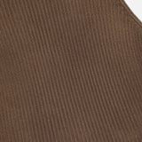 Close-up of ribbed brown fabric with diagonal lines, highlighting the texture and subtle sheen; the material looks soft and stretchy, characteristic of the Sleeveless Mockneck Sweater by RALPH LAUREN COLLECTION.