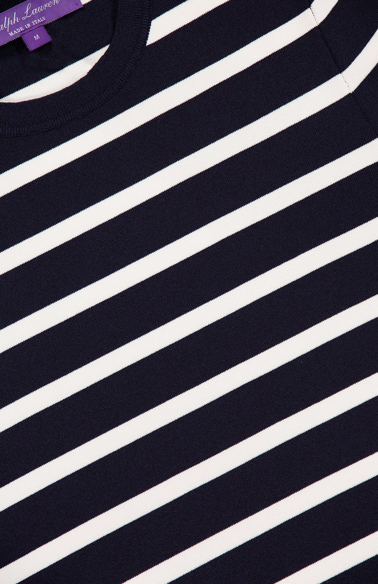 A close-up of the RALPH LAUREN COLLECTION Stretch Silk Pullover Sweater, featuring navy and white horizontal stripes, a slim fit crew neck, and a visible purple label at the neckline.