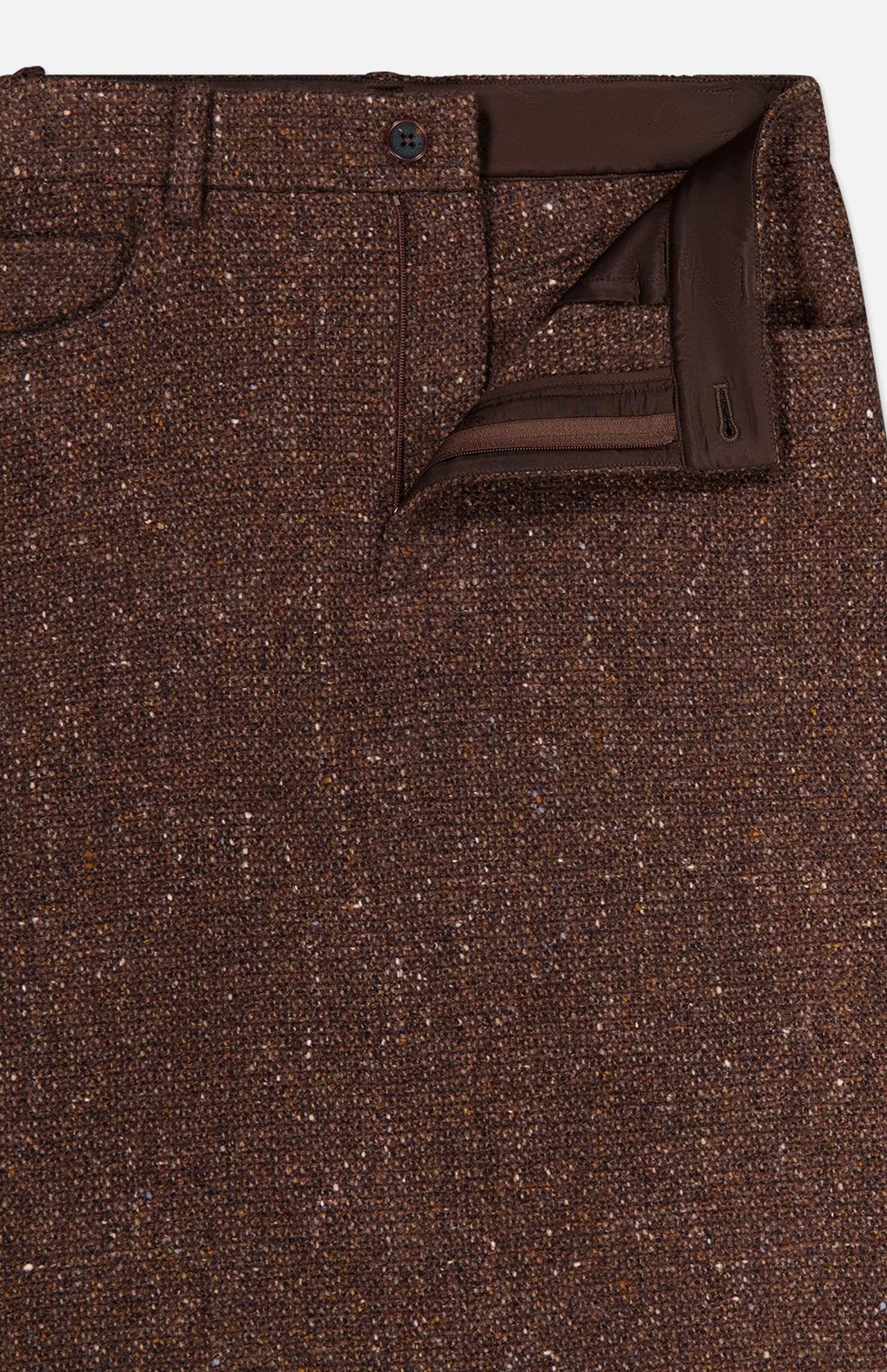Close-up of the Tweed Ankle Pencil Skirt by RALPH LAUREN COLLECTION featuring a visible waistband, belt loop, button, zipper fly, and dark brown trim along the inside of the waistband and fly.