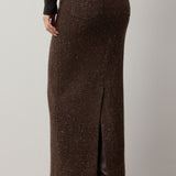 A brown Ralph Lauren Collection Tweed Ankle Pencil Skirt with a back vent and belt loops, styled in wool cashmere and paired with dark boots.