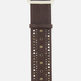 A close-up of the RALPH LAUREN COLLECTION Washed Calfskin Belt in rich brown, crafted from premium calfskin leather with a silver buckle and adorned with rows of metallic studs and brass eyelets down the center.