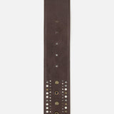 A close-up of the RALPH LAUREN COLLECTION Washed Calfskin Belt, crafted from dark brown full-grain leather and adorned with metal studs and perforations, is displayed vertically against a white background.